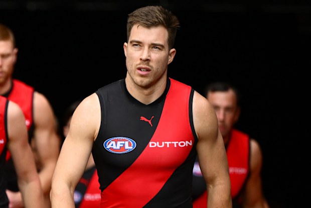 Zach Merrett leads his Bombers team out.