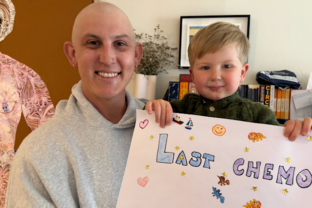 Nic Maddinson with son August after his last chemotherapy session.