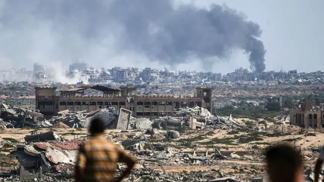 Smoke rises over Gaza City after an Israeli attack, as seen from Nuseirat, Gaza on October 02, 2025