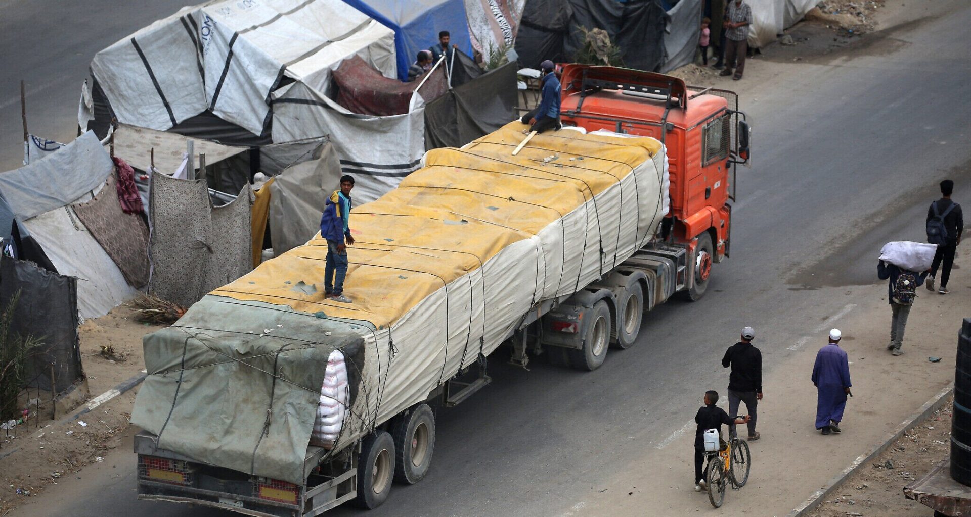 Gaza aid deliveries appear to surge; GHF distribution sites close for hostage release
