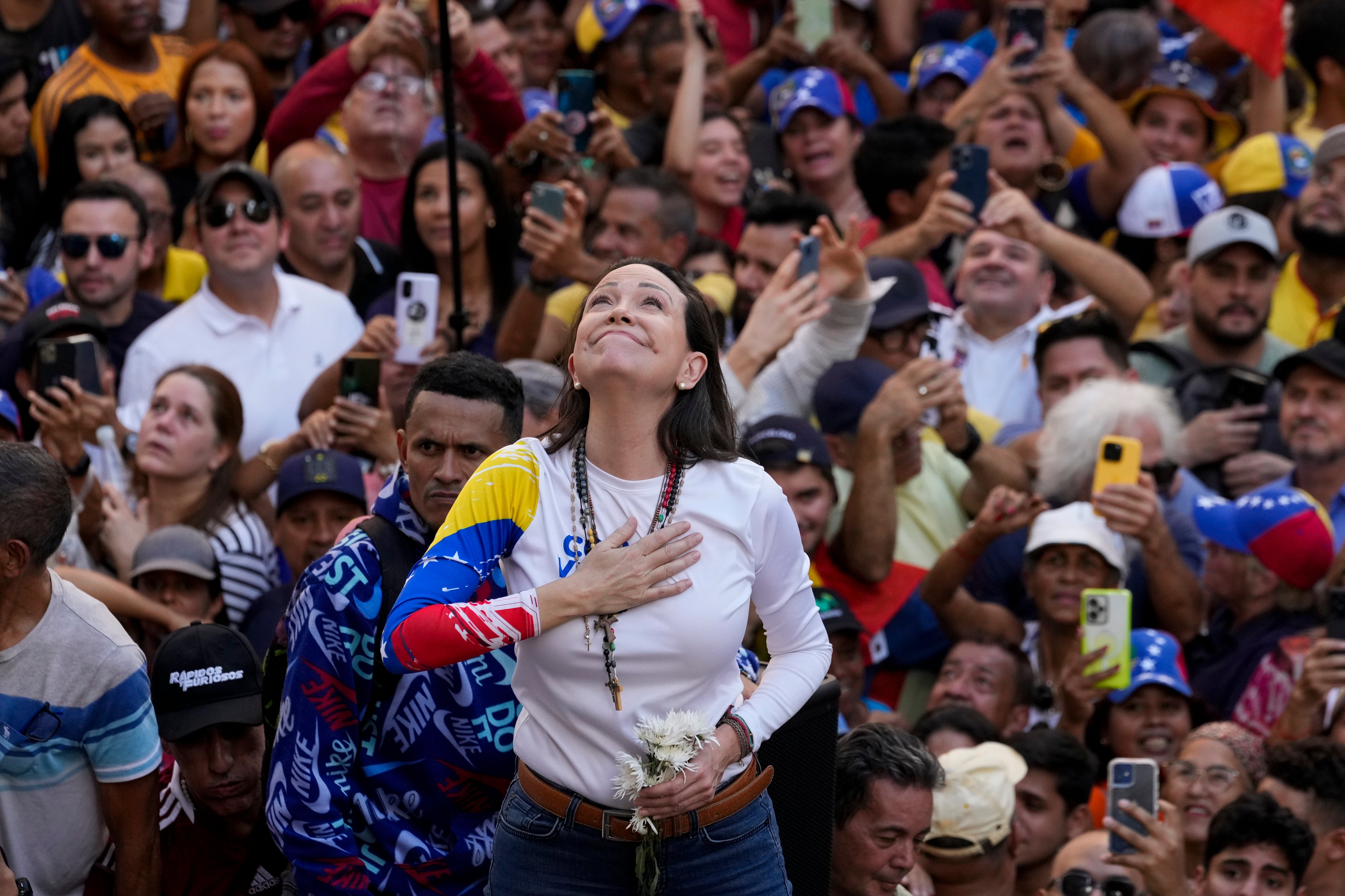 Venezuelan opposition leader Maria Corina Machado addresses supporters at a protest against President Nicolas Maduro in Caracas, Venezuela, Jan. 9, 2025, the day before his inauguration for a third term. (AP Photo/Ariana Cubillos)