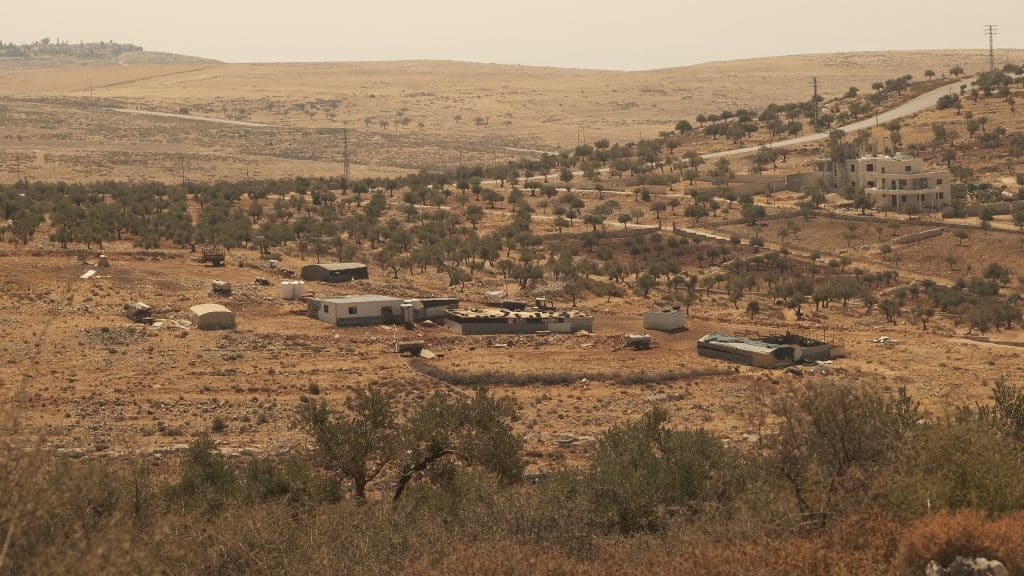 An encampment of Bedouins expelled from their herding lands established at the edge of the village of Taybeh, June 2025. (Photo: Qassam Muaddi/Mondoweiss)