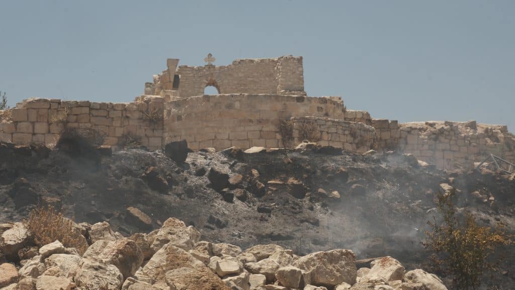 Aftermath of an Israeli settler arson attack near the al-Khader Church in the Palestinian village of Taybeh, northeast of Ramallah, July 7, 2025. (Photo: Qassam Muaddi/Mondoweiss)