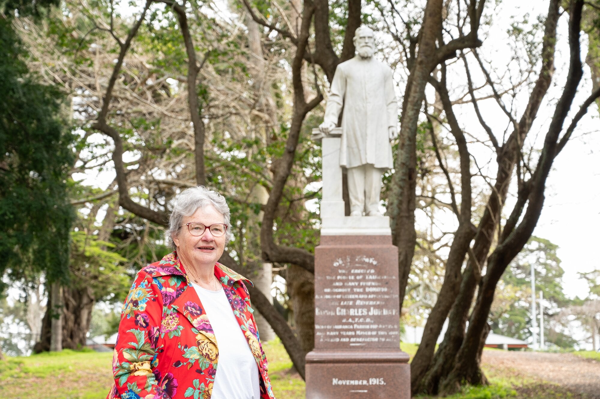  Jocelyn Mankelow with the statue of Reverend Canon Charles Jordan at Tauranga Domain.  Photo / Brydie Thompson