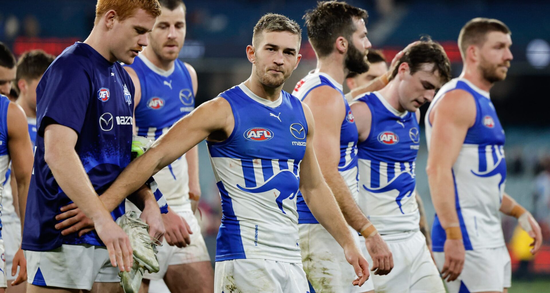 North Melbourne tagger Will Phillips draws praise after shutting down Clayton Oliver