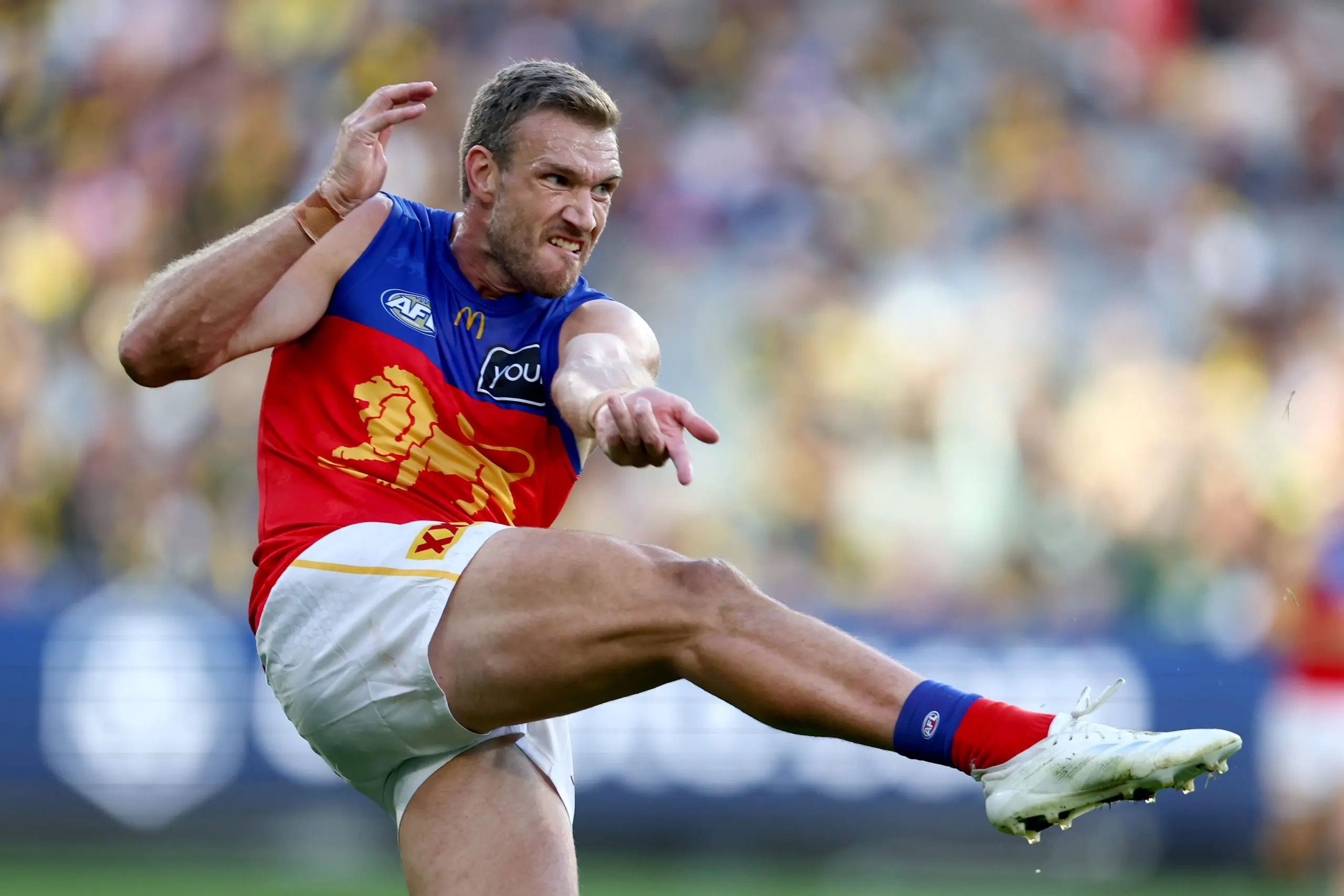 MELBOURNE, AUSTRALIA - APRIL 05: Sam Day of the Lions kicks during the round four AFL match between Richmond Tigers and Brisbane Lions at Melbourne Cricket Ground, on April 05, 2025, in Melbourne, Australia. (Photo by Josh Chadwick/AFL Photos/via Getty Images)