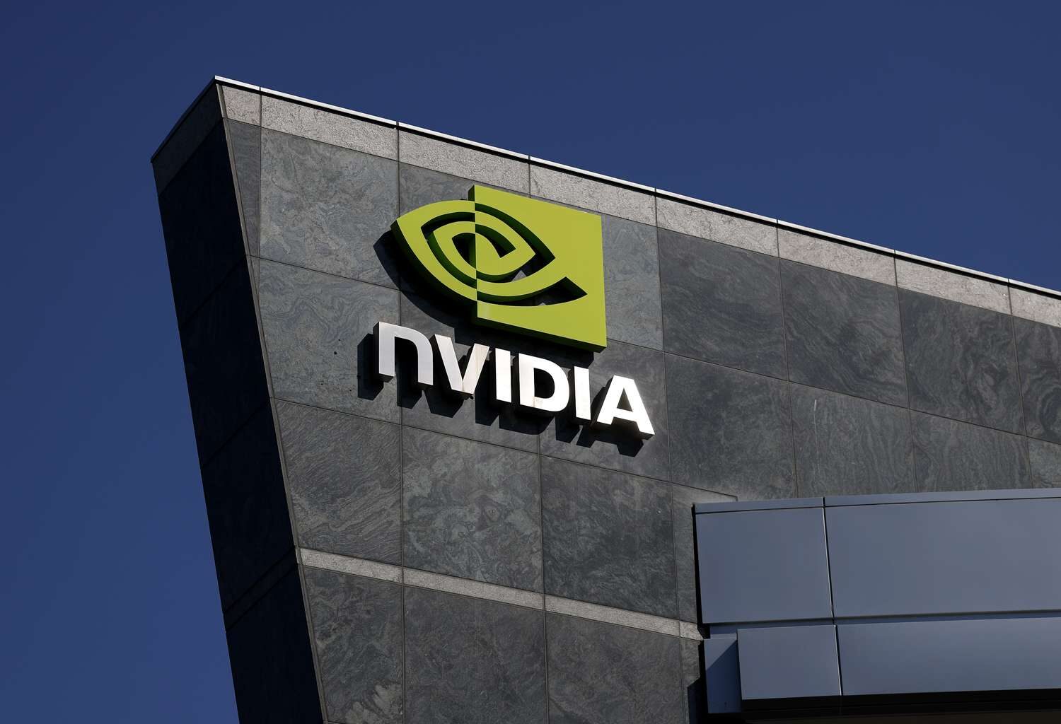 Top Stock Movers Now: Nvidia, Caterpillar, Fiserv, Hormel, and More - Investopedia