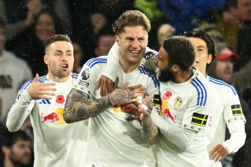 Leeds players celebrate with Joe Rodon after scoring vs West Ham.