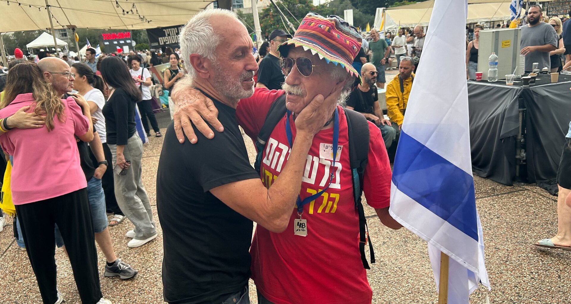 Singing, cheering, anticipation mix at Hostages Square after deal to free captives