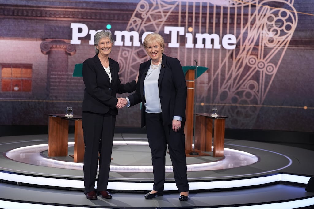 Catherine Connolly and Heather Humphreys shake hands ahead of taking part in the final debate of the Irish presidential election campaign at the RTE studios in Donnybrook, Dublin. Photograph: Niall Carson/PA Wire 