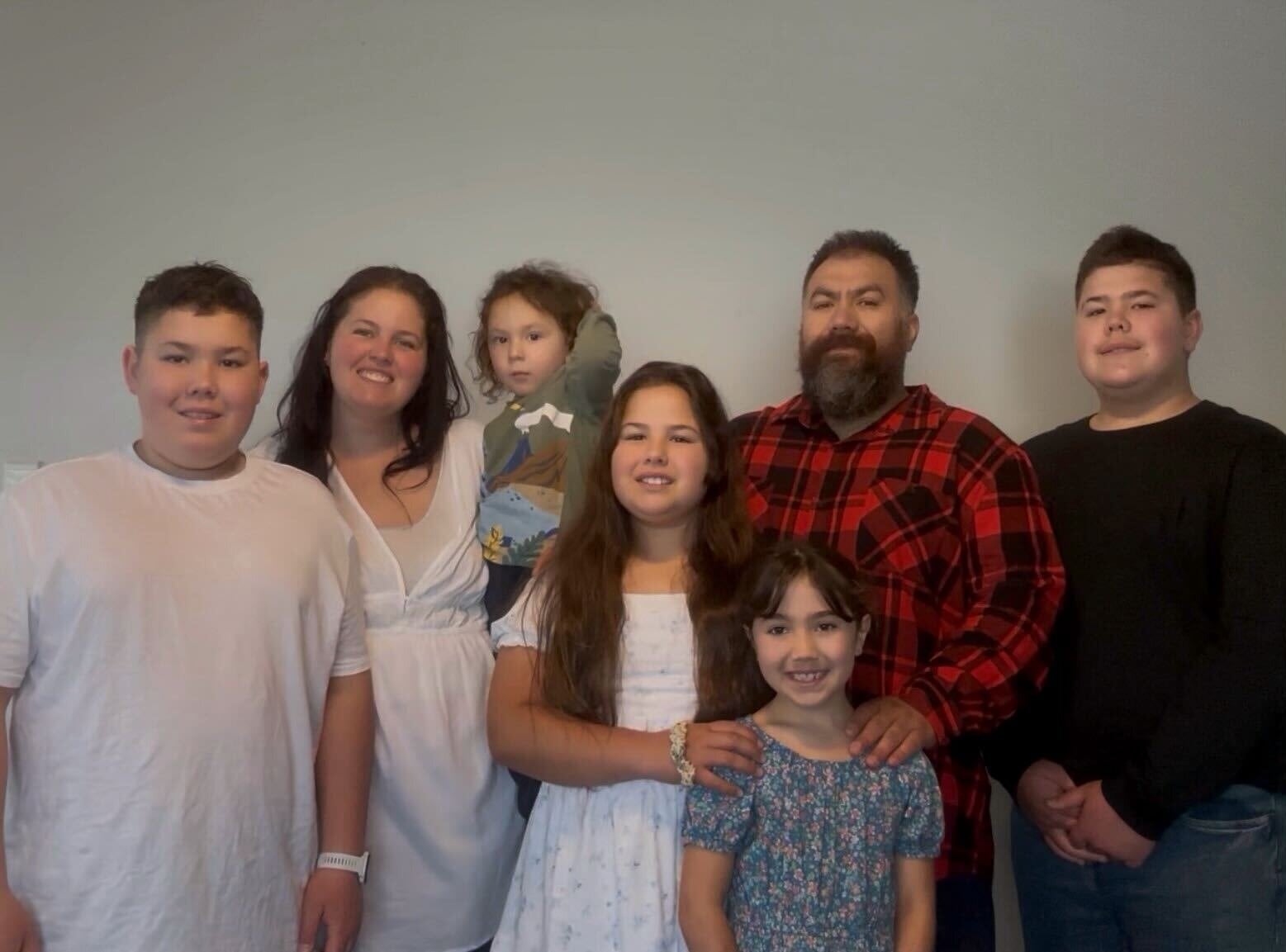 The Saia family (from left): Weston Saia, 13, mum Kayla Saia, Kainoa Saia, 3, Kalia Saia, 10, Lyssi Saia, 7, dad Chaeon Saia and Levi Saia, 15.
