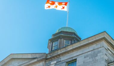 The Arts Building flag on a bright sunny day