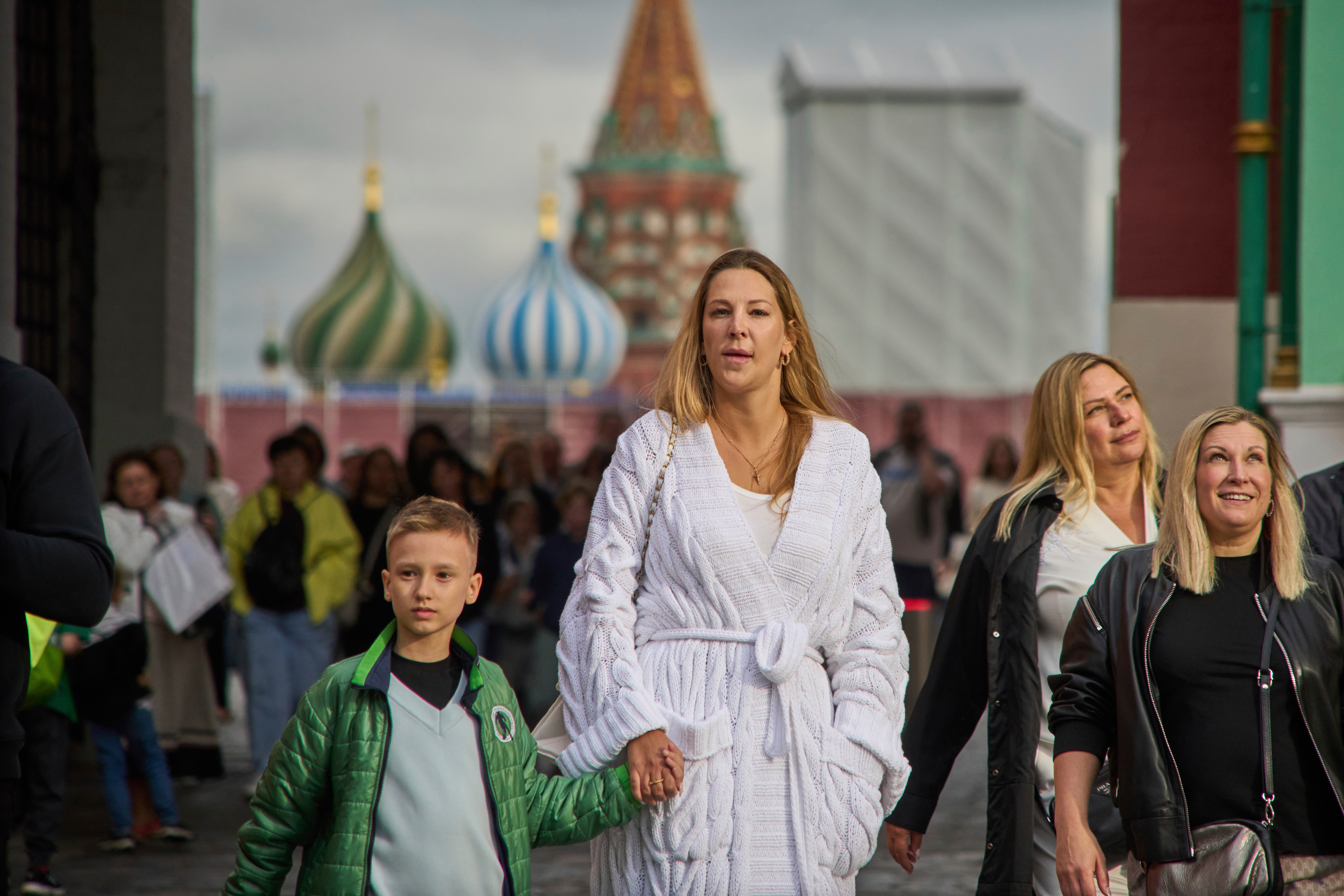 People walk from Red Square with St. Basil's Cathedral in the background in Moscow, Russia, Thursday, Aug. 14, 2025. (AP Photo/Alexander Zemlianichenko, File)