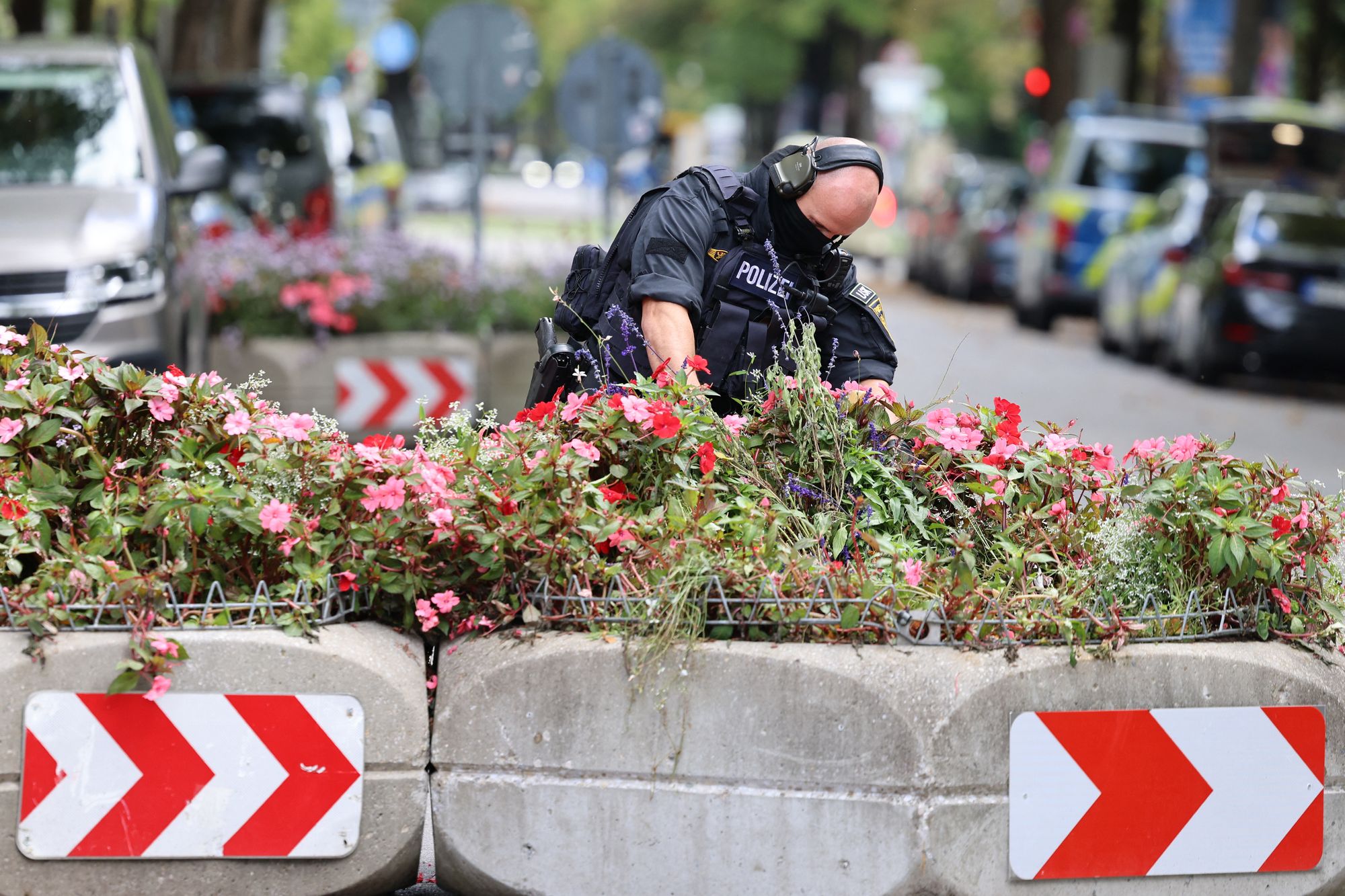 A police officer secures the area at the Theresienwiese grounds of the Oktoberfest