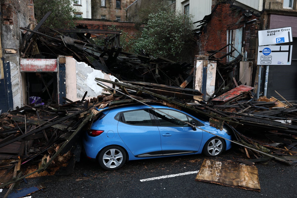 Storm Amy batters Britain with cars smashed and trees downed as weather warning extended