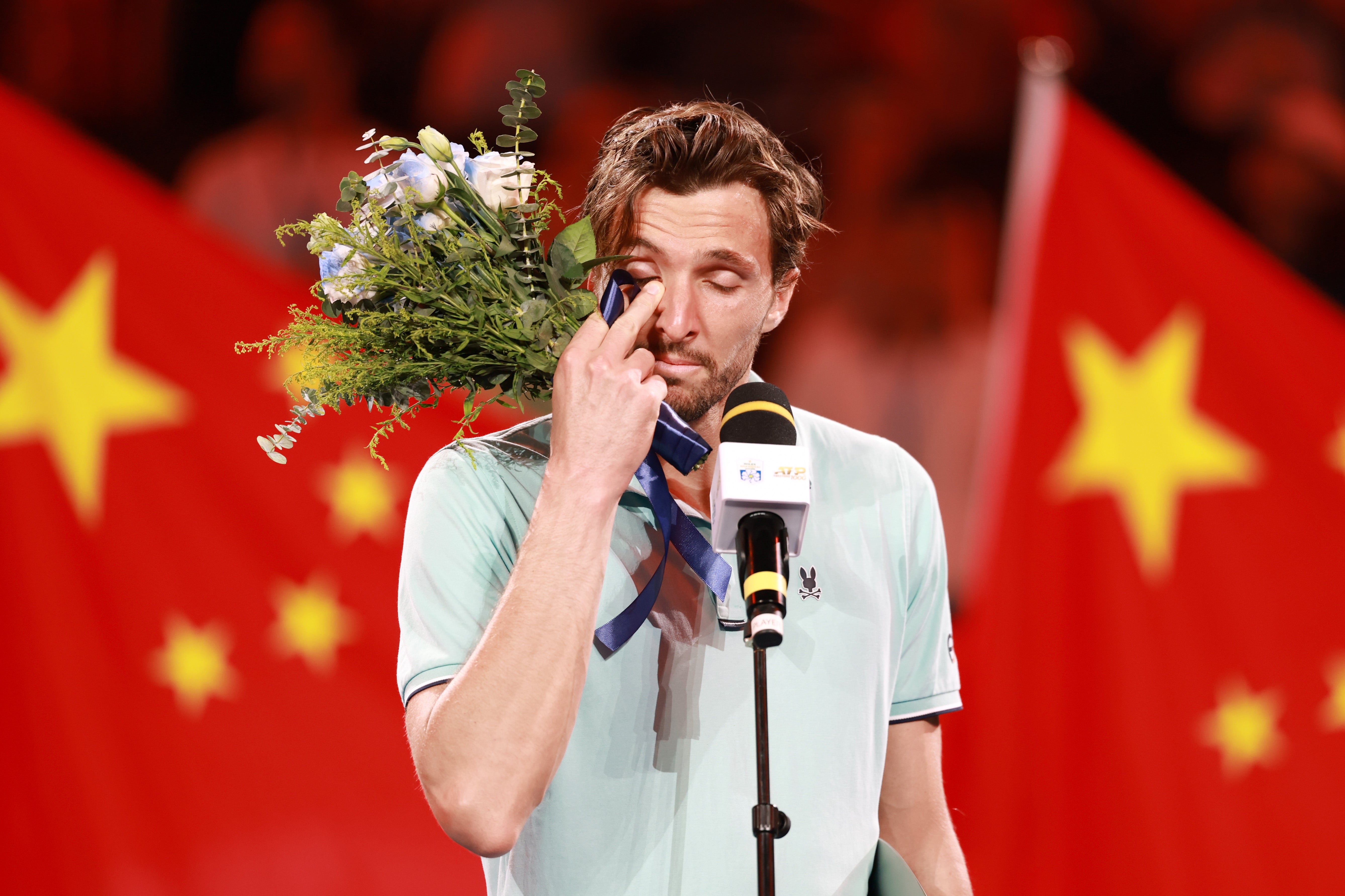 Rinderknech broke into tears as he congratulated his younger cousin during the trophy ceremony