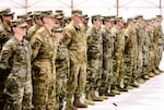 Oregon Army National Guard Soldiers with Company G, 1st Battalion, 189th Aviation Regiment, stand in formation during a demobilization ceremony honoring their return from overseas deployment, March 4, 2018 in Salem, Oregon. 