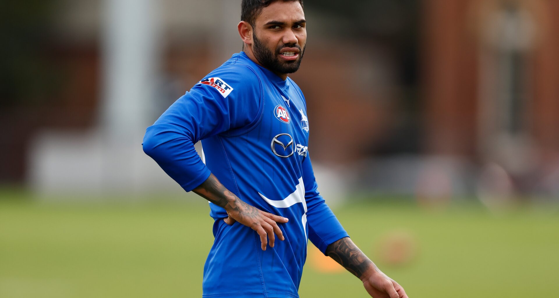 Sacked ex Kangaroos midfielder cleared to return to AFL