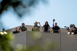 U.S. Department of Homeland Security Secretary Kristi Noem stands on the roof of the U.S. Immigration and Customs Enforcement building in South Portland on Tuesday, Oct. 7, 2025.