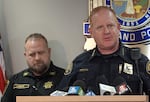 Portland Police Bureau Chief Bob Day (right) addresses the media last year.