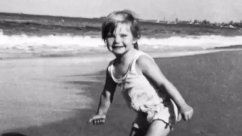 Grimmer family Cheryl Grimmer, three, at the beach in 1970