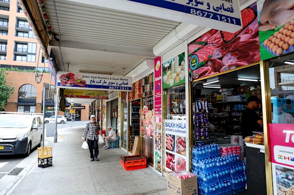 The Mason & Main apartment complex rises behind traditional Merrylands shops. 