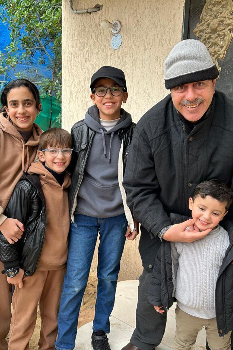 The Amawi children pictured with their grandfather in January, 2025.