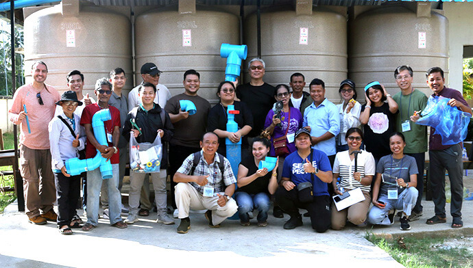 WASH Academy participants celebrate the successful installation of four rainwater-harvesting tanks at Hun Sen Sa’ng High School in Phnom Penh, Cambodia, on Oct. 15. Photo by the Rev. Thomas E. Kim, UM News.