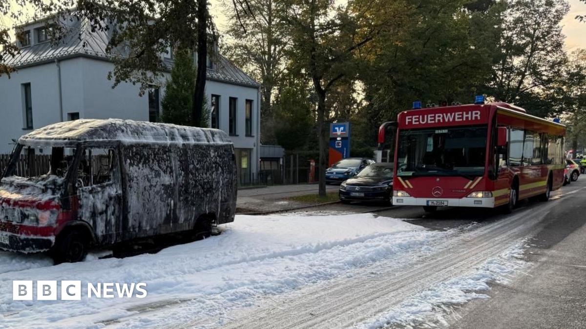 A burnt-out van is covered in foam after being extinguished by fire fighters in Munich, Germany, October 1, 2025. Police and firefighters were out in large numbers along Munich's Lerchenauer Strasse arterial road after a local newspaper reported that explosions and gunshots had been heard.