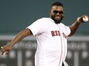 Former Boston Red Sox player David Ortiz throws out the first pitch before the game between against the New York Yankees at Fenway Park. 