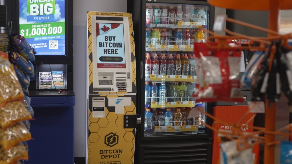 A crypto ATM in a variety store beside a fridge full of Gatorade.