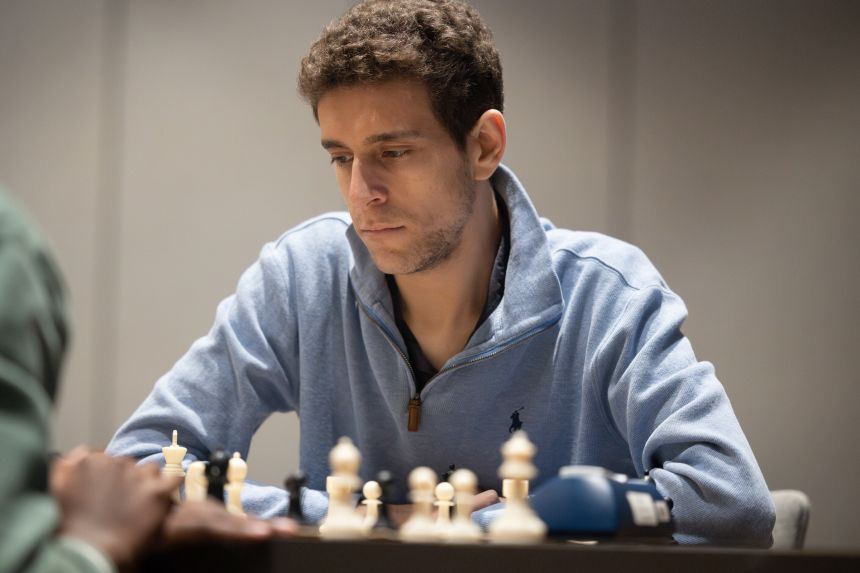 Daniel Naroditsky is seen playing chess in a photo released by Charlotte Chess Center, where he was a head coach.
