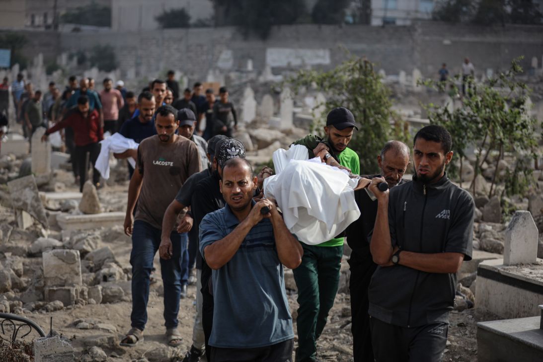 People attend the funeral held at Al Ahli Baptist Hospital for Palestinians who were killed in the Israeli attack on Zaytun, despite the ceasefire in Gaza City, Gaza, on Wednesday.