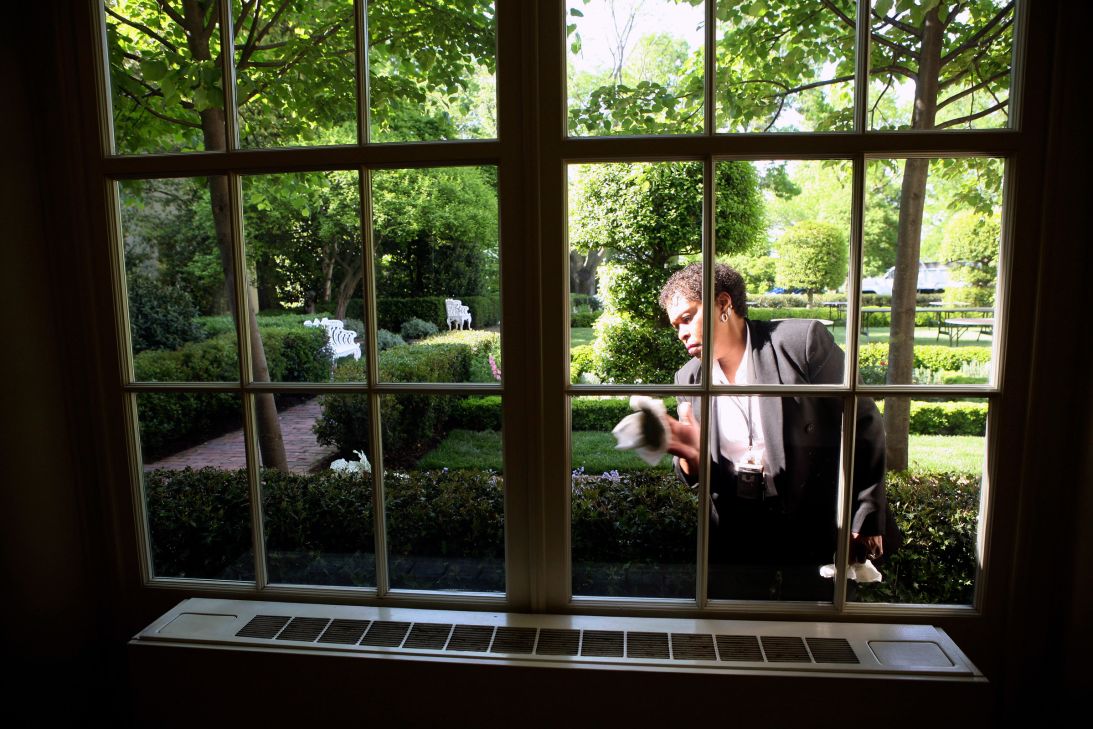 Windows are cleaned at the White House on May 4, 2007, in preparation for a state dinner in honor of Queen Elizabeth II.
