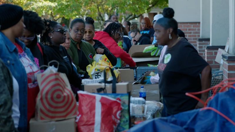 Federal workers form line down the block for food pantry as shutdown hits third-week mark