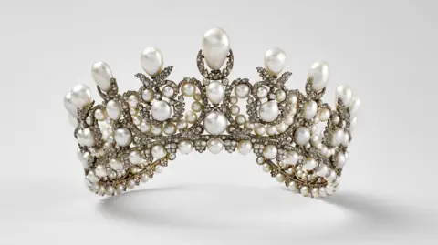 Louvre Museum A gold tiara encrusted with diamonds and pearls stolen from the Louvre