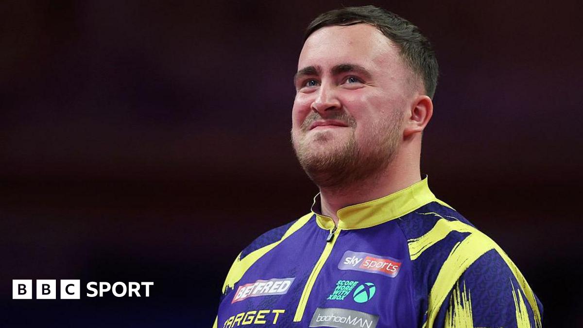 Luke Littler smiling