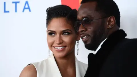 Getty Images Cassie Ventura and Sean Combs pose together on a red carpet