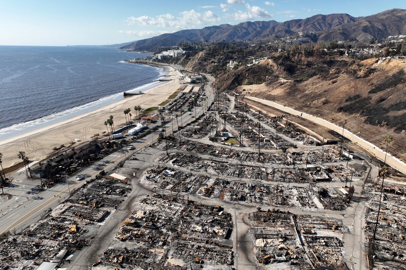 Authorities charge man with sparking deadly January wildfire that leveled LA neighborhoods