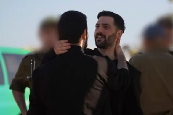 Gali and Ziv Berman embrace on the Gaza Strip after being released by Hamas on Monday.