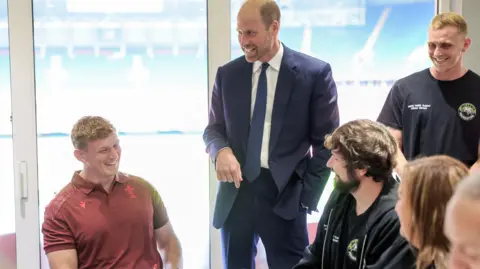 Reuters Prince William in a suit and tie at the Jac Lewis Foundation in Cardiff