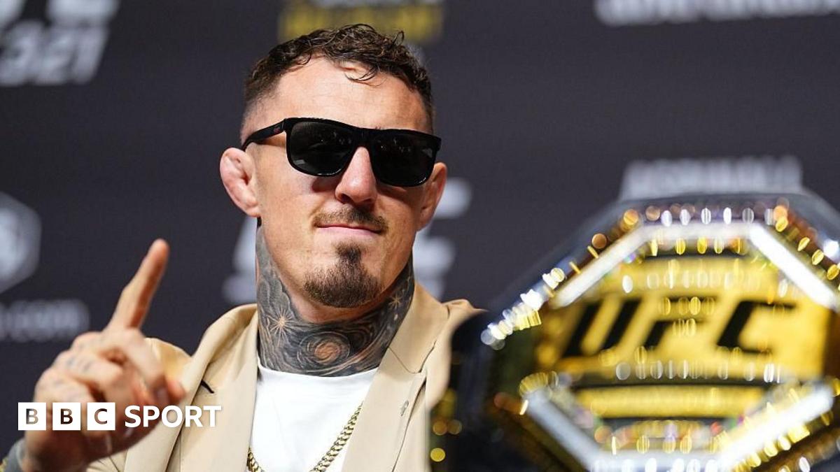 Tom Aspinall faces off with Ciryl Gane at a news conference