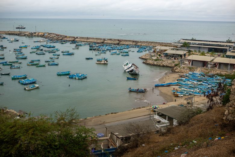 Fishermen on the shores of a coastal town in Ecuador's Santa Elena Province.