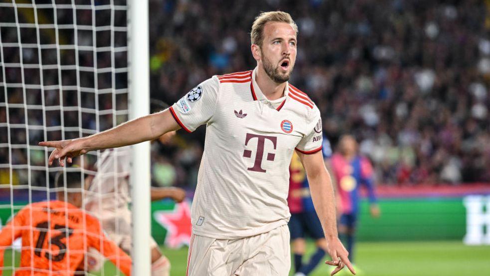 Harry Kane celebrates scoring for Bayern Munich against Barcelona in October 2024