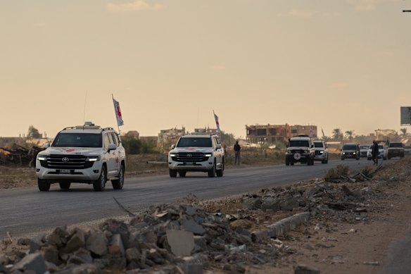ICRC vehicles transporting released Israeli hostages head toward the Israeli border in Khan Younis.