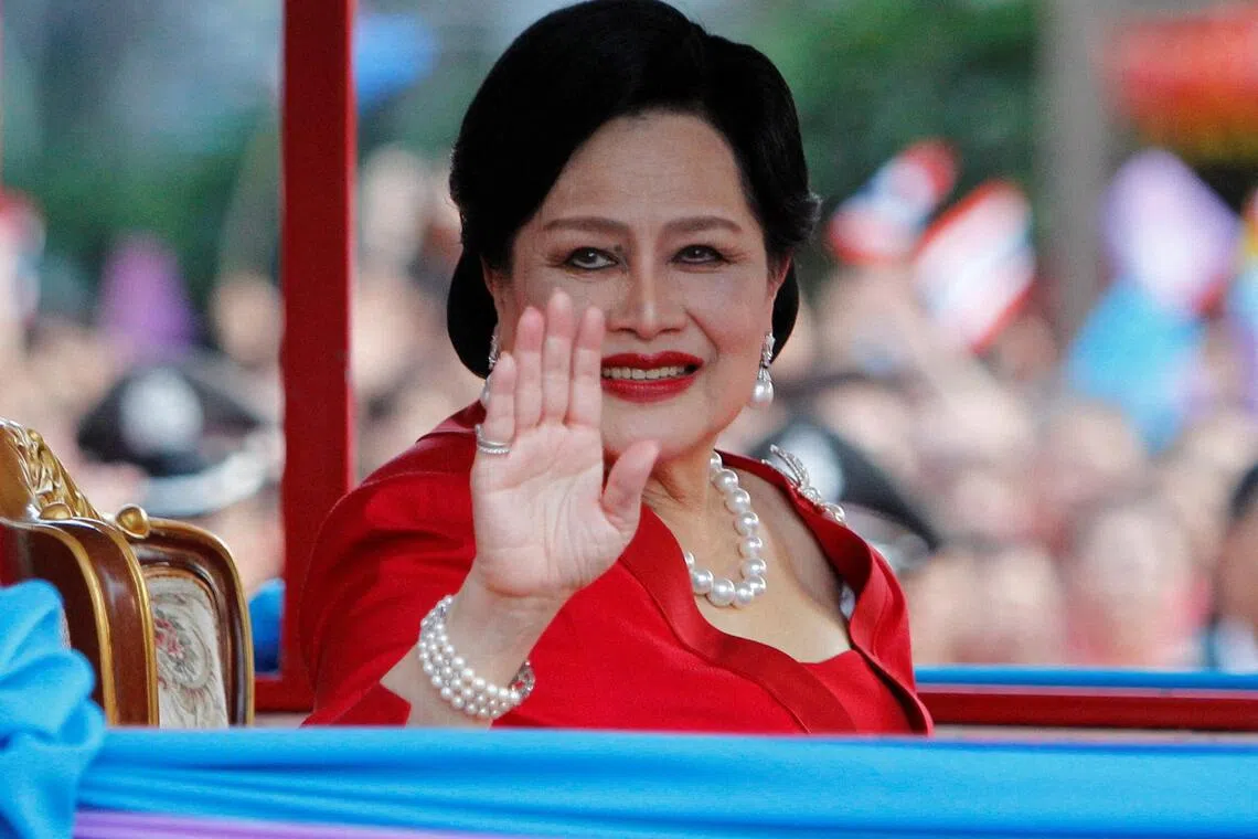 The late Thai Queen Sirikit waves to people during her arrival in Chinatown for Lunar New Year celebrations in Bangkok on Jan 23, 2012. She died on Oct 24, aged 93.