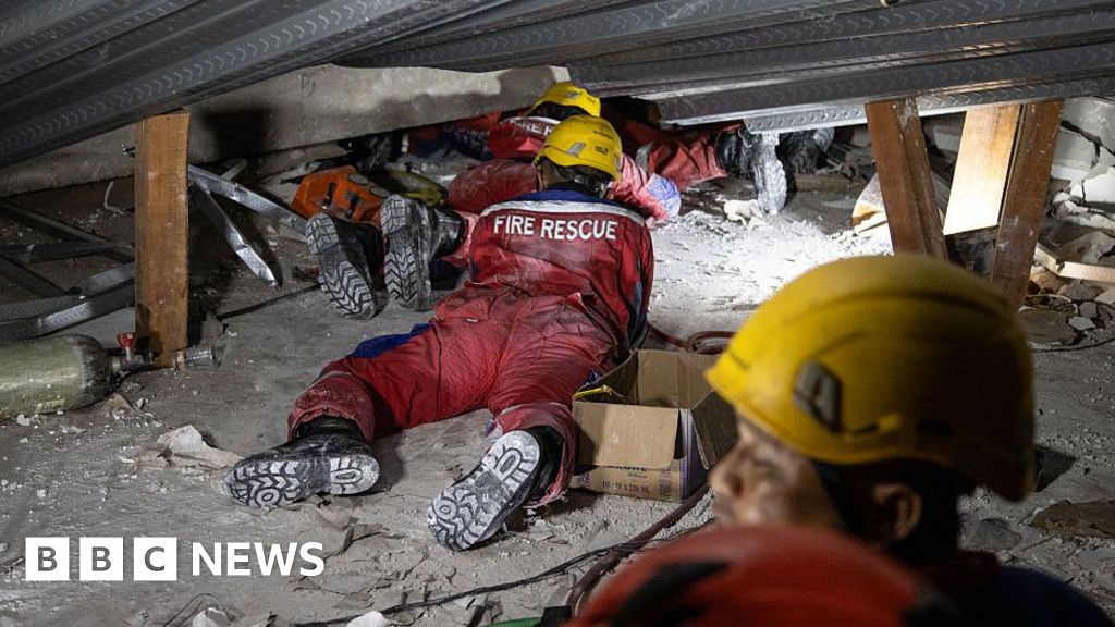 Indonesia rescuers race to find survivors after school collapse traps dozens