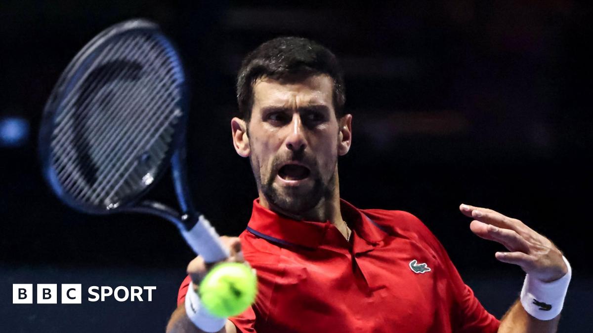 Novak Djokovic hits a return at the Six Kings Slam exhibition event