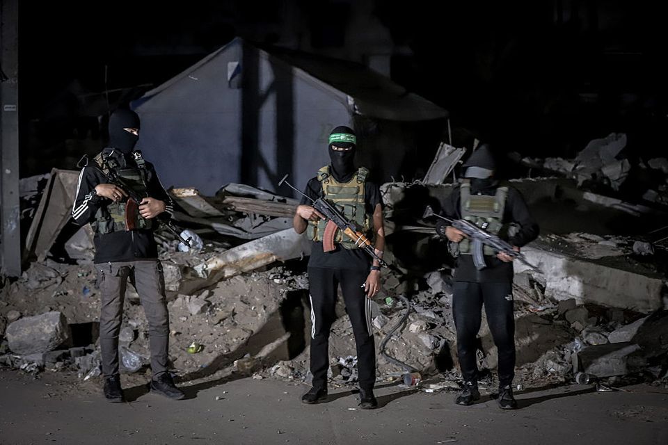Bodies of two Israeli hostages are handed over to the International Committee of the Red Cross (ICRC) by the Al-Qassam Brigades. Photo: Saeed M. M. T. Jaras/Anadolu.