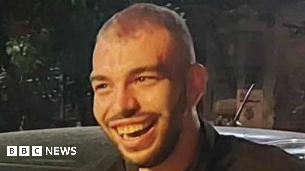 Antonis Antoniadis is pictured with short hair and stubble is smiling and looking to the left of camera.